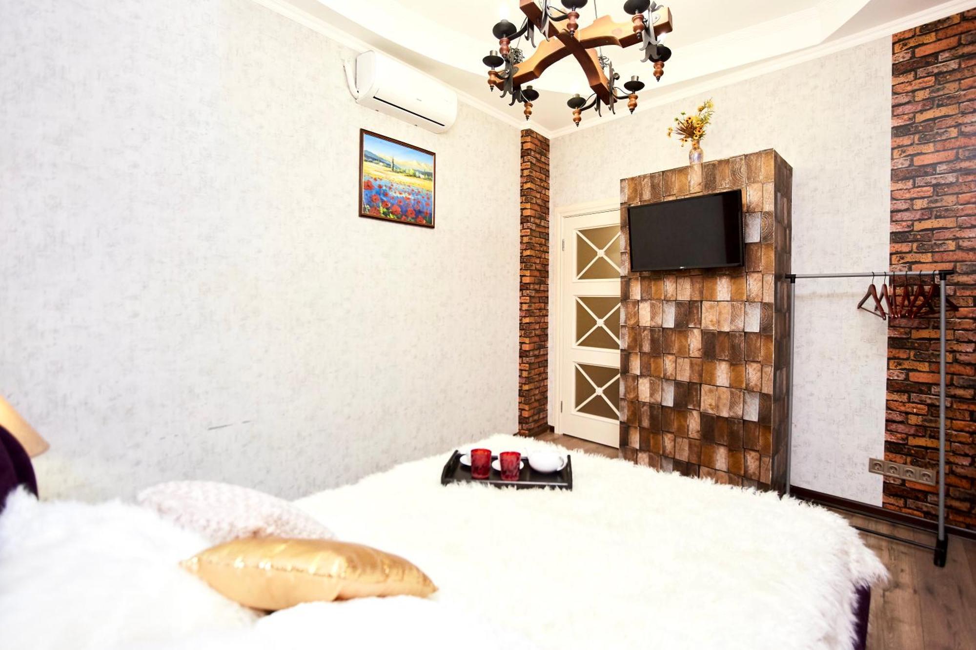 Arcadia Promenade Grand Apartments Одесса Номер фото